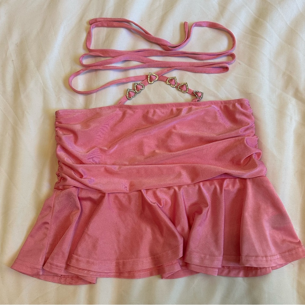 Light pink mini skirt with ruffles